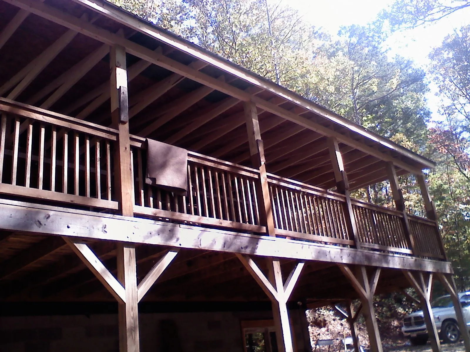 Timber framing under a new elevated porch and deck — Roof Leak Repair in Fort Harrison by Roofing Brothers
